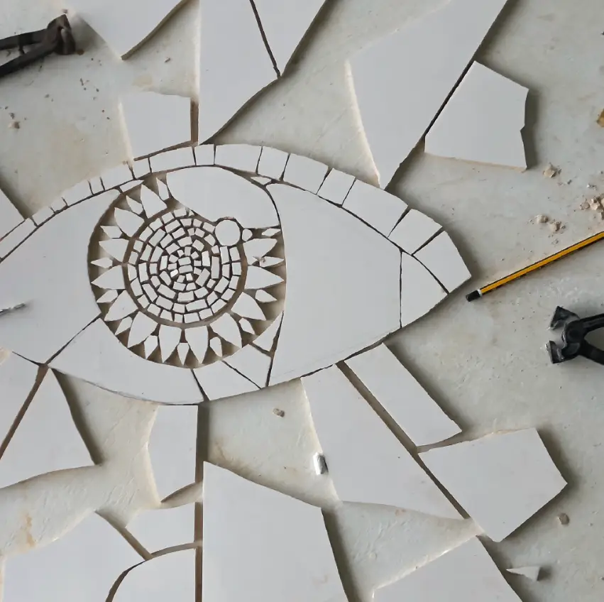 Repurposing an old table with recycled tiles
