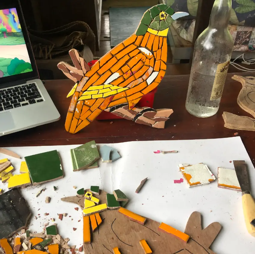 Fiji Orange Dove (male & female) made from recycled tiles from the old Gulabdas building in Savusavu town